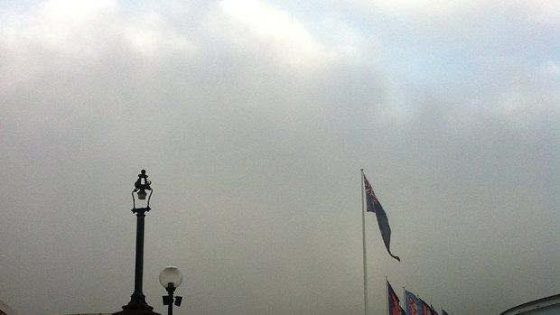 Fog covers the skyline in this photo taken from Pyrmont Bridge.