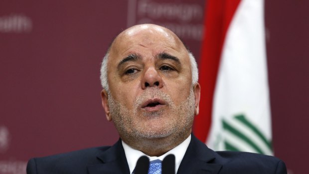 Fighting IS ... Iraq's Prime Minister Haider al-Abadi attends a press conference with Britain's Foreign Secretary Philip Hammond and US Secretary of State John Kerry at the Foreign and Commonwealth Office in London in January 2015.