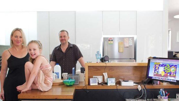 Moving out &#8230; Clare Joyce, Michael Adams and daughter Ava.