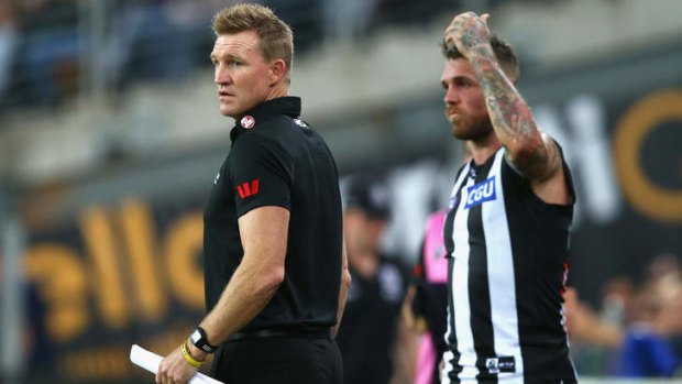 Coaches corner: Nathan Buckley with Dane Swan on Saturday night.