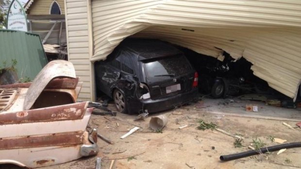 An elderly woman has crashed into a shed in Ipswich.
