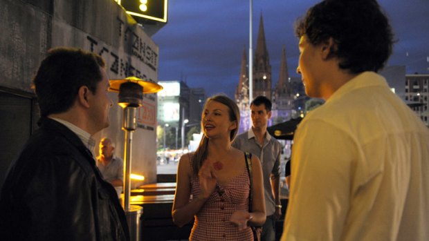 Wingwoman 'Kate' out on the town in Federation Square with clients Max and Adam.