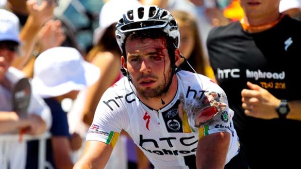 Mark Cavendish of Great Britain crosses the finish line after crashing during the final sprint.