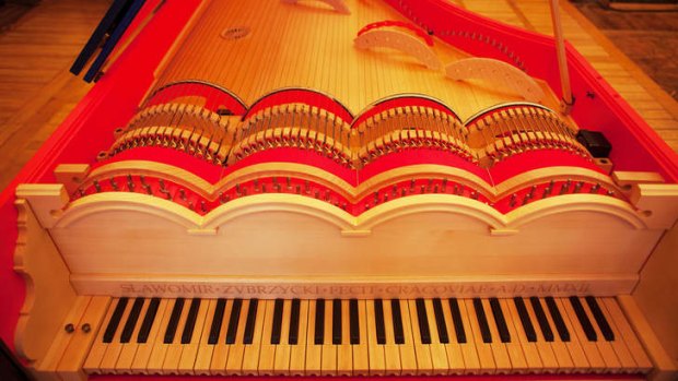 Take a bow: The viola organista's strings are played in the same way as a cello.