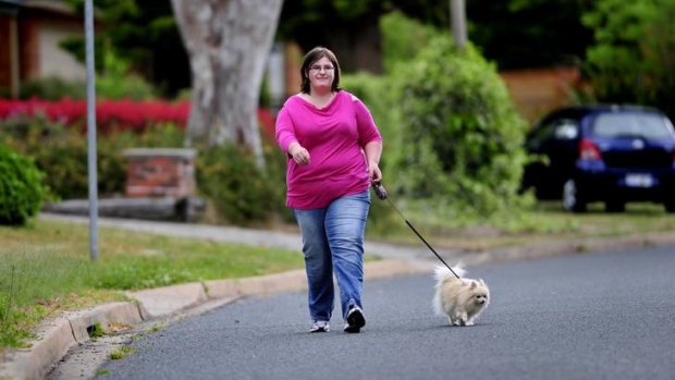 Labor voter, Peta Hamera, 21, of Pearce, with her dog Muffy.