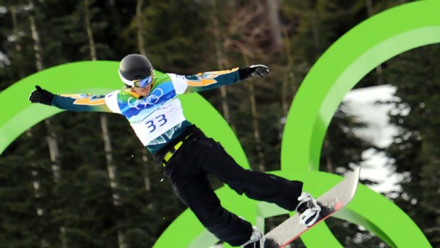 Alex Pullin of Australia takes a jump during the Men's Snowboard SBX qualifications at Cypress Mountain.