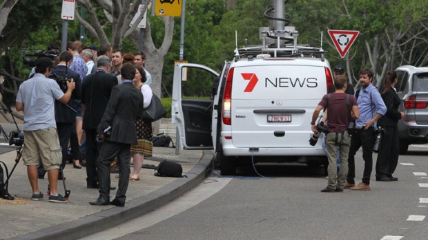 Media gather outside the Pyrmont office of Channel Seven.