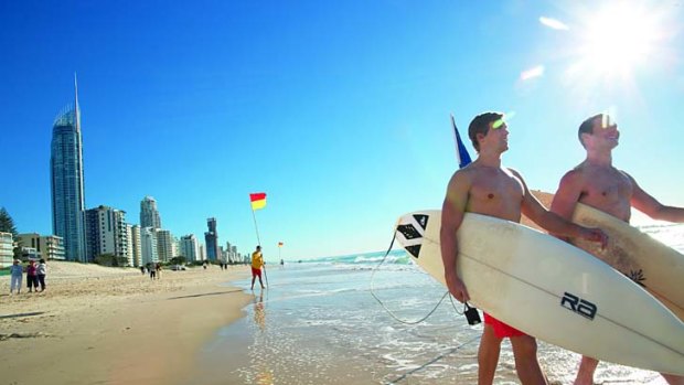Surf's up ... locals and tourists enjoy the sunshine at Surfers Paradise.