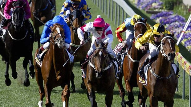 Grandera (in blue) finishes third behind Northerly in the 2002 Cox Plate.