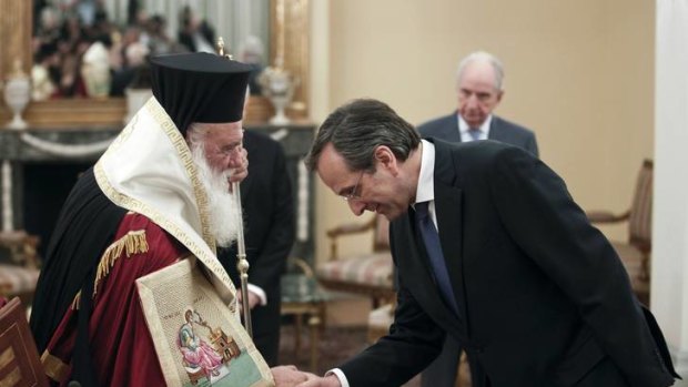 Fourth Prime Minister since November ... Greek Prime Minister Antonis Samaras after being sworn in.