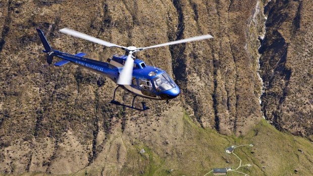 The  helicopter soars above   Minaret Station Alpine Lodge, Lake Wanaka.