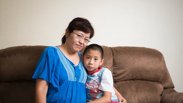 Nancy Ju and Allan Liang, 9, travel 20km everyday to the Duffy Primary's learning support unit. 