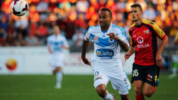 Spirit: Archie Thompson chases after the ball in Friday night's match against Adelaide.
