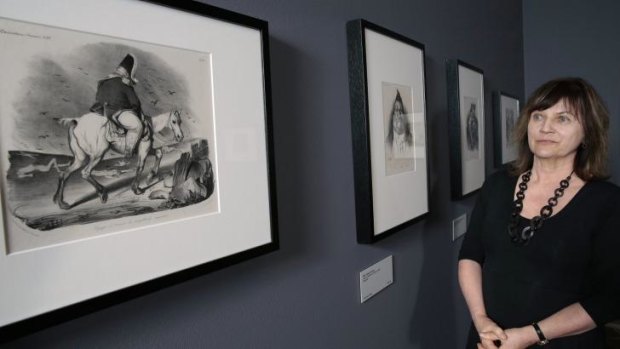 National Gallery of Australia senior curator of international prints Jane Kinsman with works by Honore-Victorin Daumier that are part of the exhibition Impressions of Paris: Lautrec, Degas, Daumier.