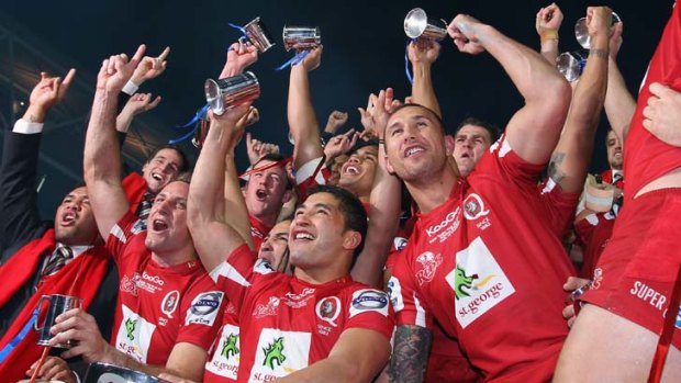 The Reds celebrate winning the 2011 Super Rugby grand final.