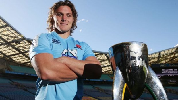 Hoop dreams: Waratahs skipper Michael Hooper poses with the Super Rugby trophy at Allianz Stadium on Friday.