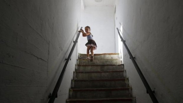 A girl leaves a bomb shelter after a siren warning of incoming rockets was sounded in the southern Israeli city of Ashkelon on Wednesday.