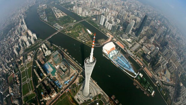 Modern metropolis ...  an aerial view of Canton Tower and the Pearl River.