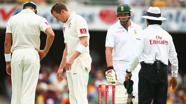 Out, then not out: Peter Siddle looks at his footmarks after his dismissal of Jacques Kallis on the first day was ruled not out on review, due to a no-ball.
