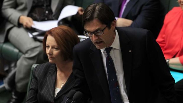 Former climate change minister Greg Combet and prime minister Julia Gillard.