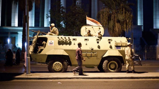 An Egyptian army armoured vehicle is seen in front of the Supreme Constitutional Court in Cairo ahead of planned demonstrations.