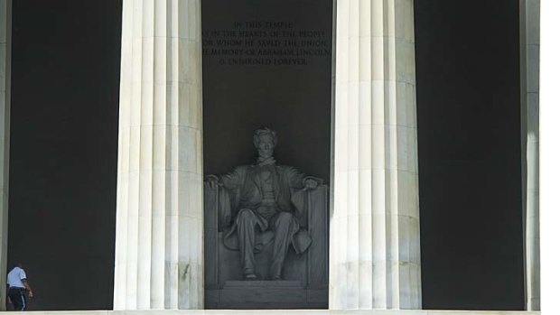 A single security guard patrols the closed Lincoln Memorial in Washington.