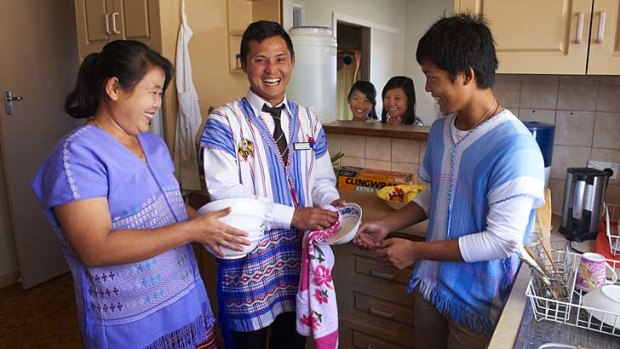 New opportunities &#8230; Burmese refugee Gay Htoo Paw, centre, moved his family from Sydney to Albany in search of work.
