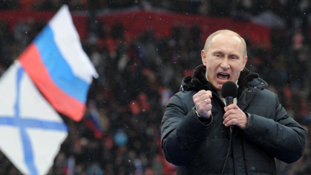 Russian presidential candidate, Prime Minister Vladimir Putin delivers a speech during a rally of his supporters at the Luzhniki stadium in Moscow.