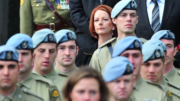 Mourners, including Prime minister Julia Gillard, pay their respects to fallen soldier Lieutenant Marcus Case at St Bedes in Balwyn.