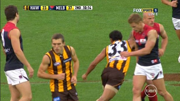 A sequence of screen grabs (above and below) shows Cyril Rioli making contact with Nathan Jones.
