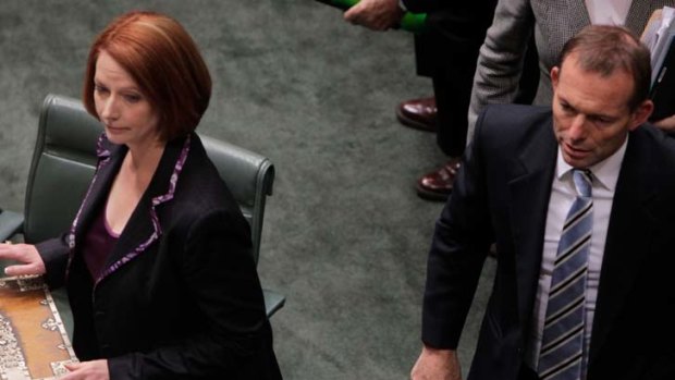 Battle field ... Prime Minister Julia Gillard and Opposition Leader Tony Abbott in the House.