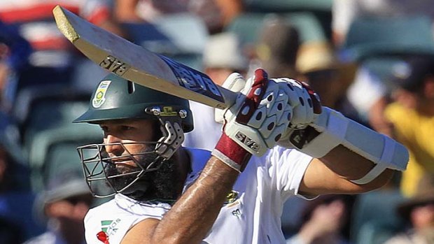 Masterclass: Hashim Amla smashes more runs on his way to 99 not out at stumps.