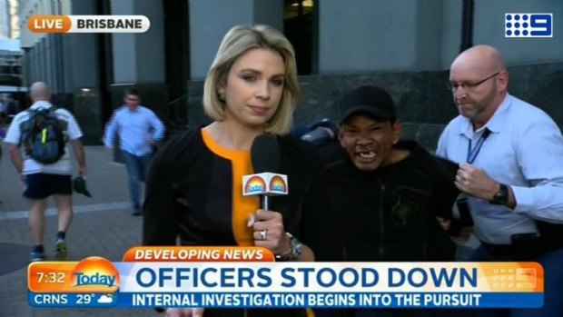 A Today reporter had her live cross interrupted by a dramatic arrest on Friday.