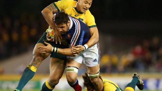Starved: Israel Folau gets near the ball in a rare moment  against the French.