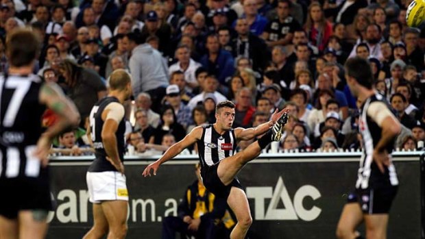 Magpie forward Jarryd Blair, who revelled in last night's big-match atmosphere, kicks his fifth goal.