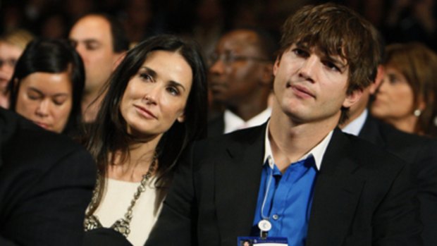 In sync ... Ashton Kutcher and Demi Moore.