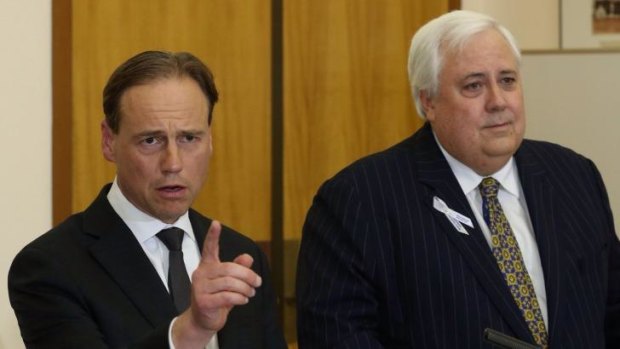 "Paying polluters not to pollute is just dumb and I resent my taxes being used for this purpose": Greg Hunt and Clive Palmer address the media on Wednesday.