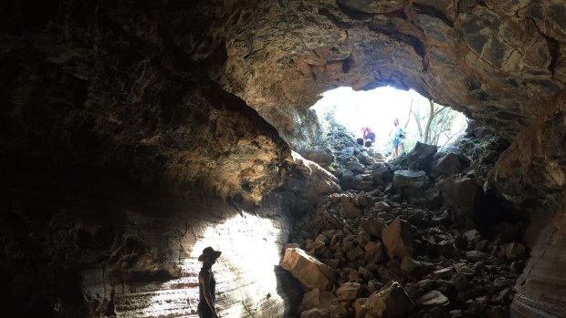 Rocky decent: Inside a lava tunnel on Santa Cruz.