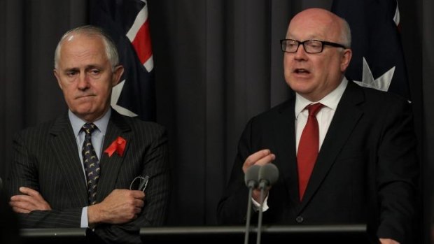 Communications Minister Malcolm Turnbull and Attorney-General George Brandis brief the media on the new legislation on Thursday.