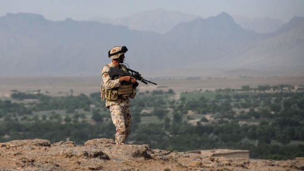 A soldier on patrol in Afghanistan, where Chris Masters sees an uncertain aftermath.
