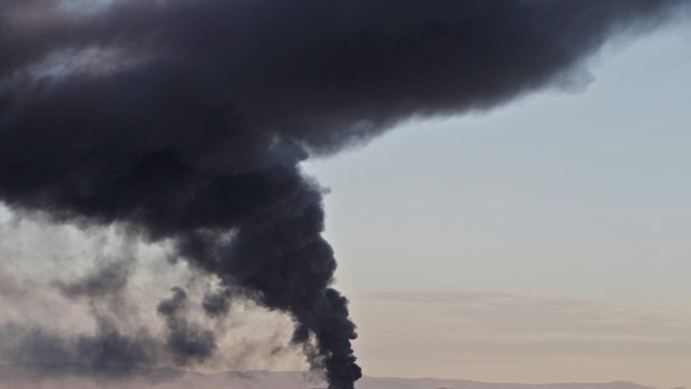 Smoke rises from the industrial fire in North Canberra.