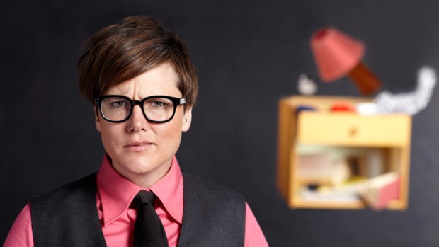 Bespectacled Tasmanian Hannah Gadsby finds "Happiness is a Bedside Table" at the Brisbane Comedy Festival.