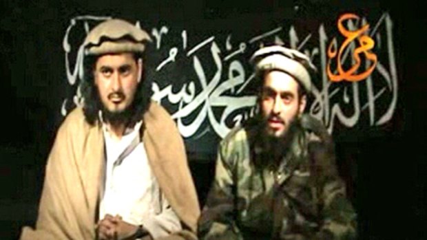 Humam al-Balawi (right), the suicide bomber who attacked the CIA base in Afghanistan last week, on video with the leader of the Pakistani Taliban, Hakimullah Mehsud.