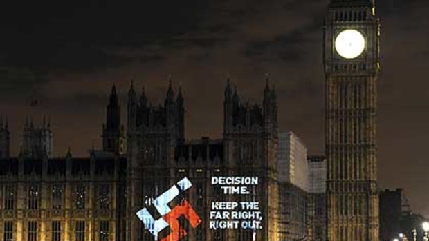 The swastikae projected on to the Houses of Parliament in London.