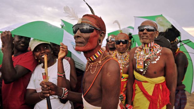 Members of the Rendile tribe are pictured before total hybrid eclipse in Sibiloi national Park in Turkana in Kenya.