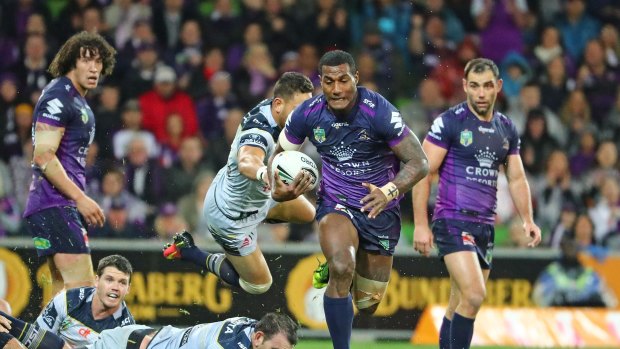 On the fly: Suliasi Vunivalu streaks away to score a vital try in the Storm's victory over the Cowboys during the finals.