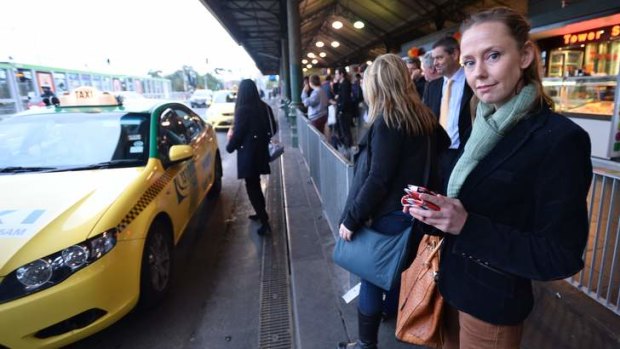 Lauren Rielly uses her mobile phone and two apps to summon cabs and avoid delays.