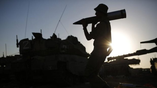 Israel says its troops are ready outside the Gaza border should the ceasefire collapse.