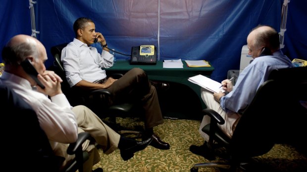 Spying is real: President Barack Obama is briefed inside a secure tent setup near his hotel suite in Rio de Janeiro in 2011 - one of many counter-snooping measures US officials have embraced in recent years. 