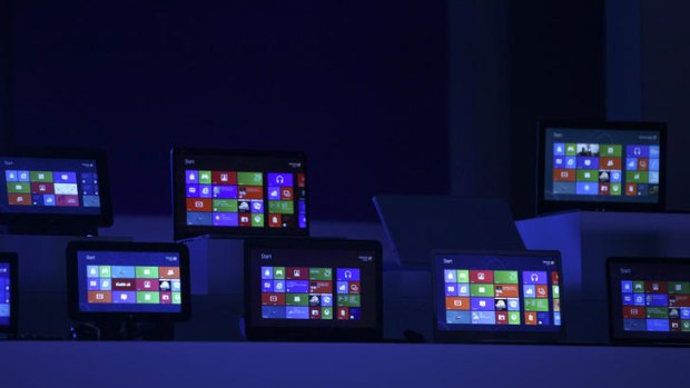 The Windows 8 software homepage is displayed on tablet devices at the Microsoft  Windows 8 software consumer preview event at the Mobile World Congress in Barcelona